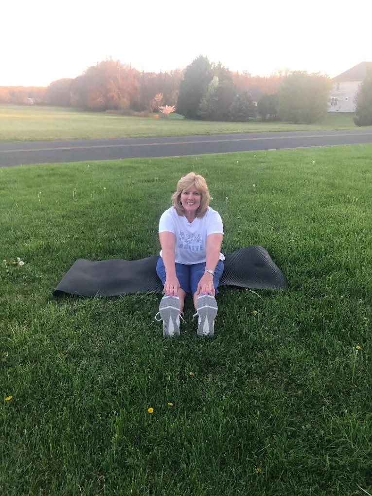 Christine supporting an outdoor wellness session
